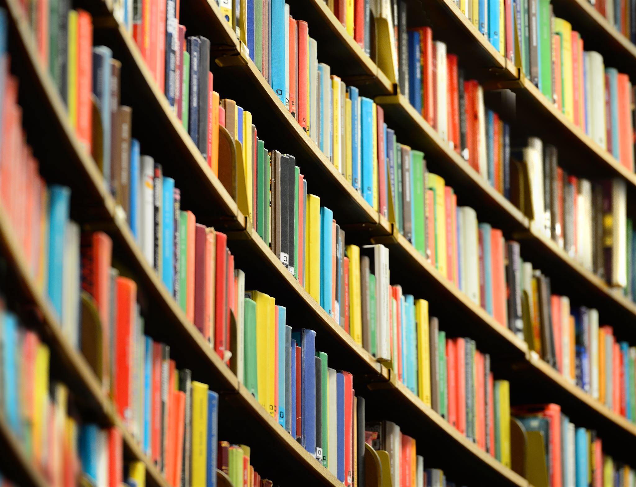 Close-up-of-bookshelves-in-a-public-library