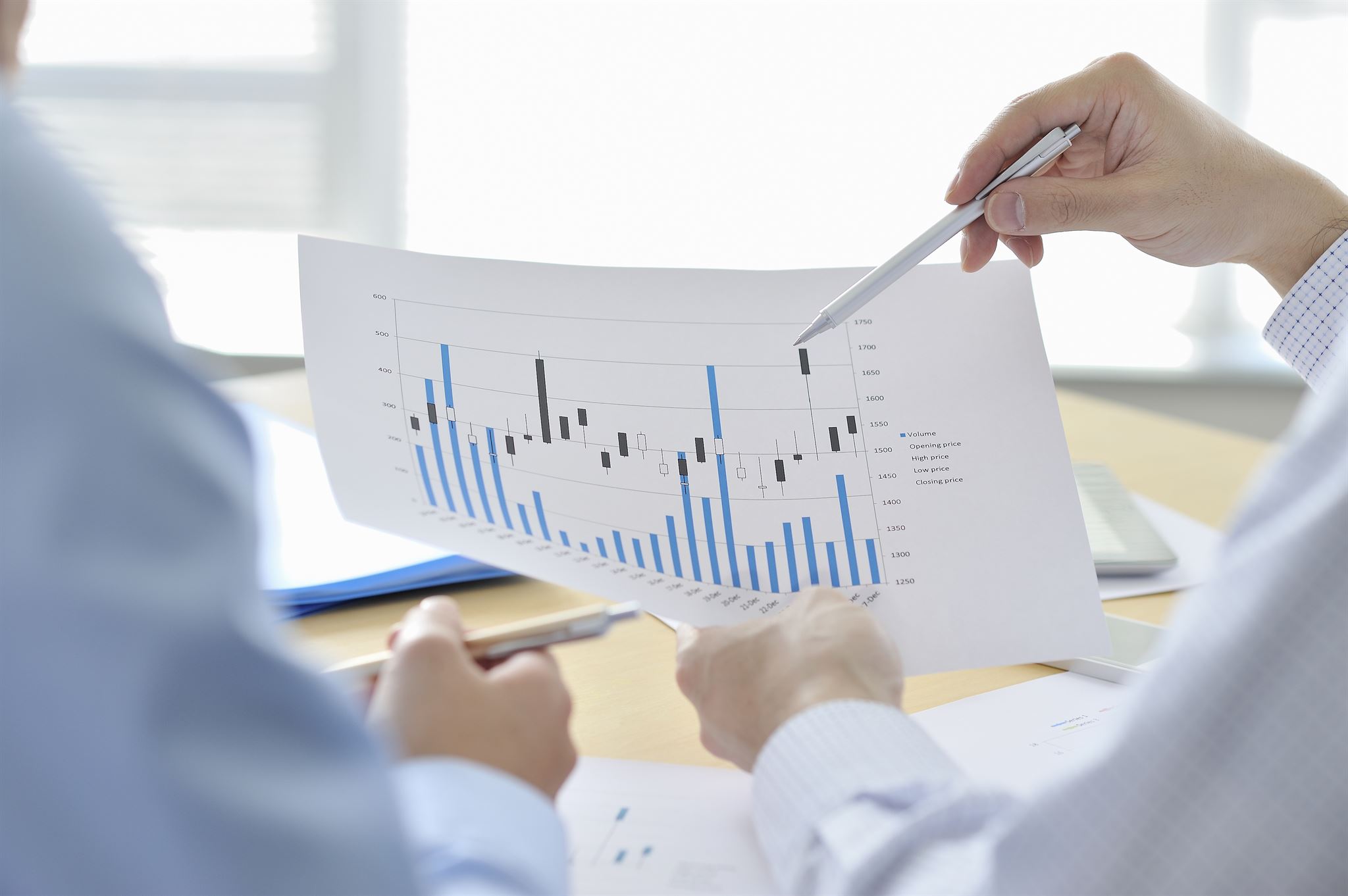 Business meeting with charts